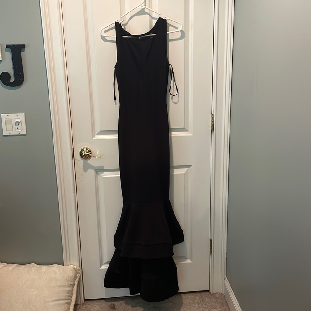 Lightly used prom dress; worn once, fully dry cleaned and ready!
